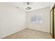 Bright bedroom with tile floors and a view out the window, featuring a closet at 3132 Centavo Dr, Las Vegas, NV 89117