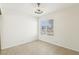Clean, well-lit bedroom with neutral walls, tile flooring, and bright natural light at 3132 Centavo Dr, Las Vegas, NV 89117