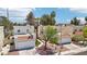 Inviting two-story home featuring a pristine garage, quaint yard, and desert-style landscaping at 3132 Centavo Dr, Las Vegas, NV 89117