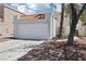 Charming two-story home featuring a large two-car garage and desert landscaping at 3132 Centavo Dr, Las Vegas, NV 89117