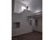Bright living room with a high ceiling and unique architectural details and staircase at 3132 Centavo Dr, Las Vegas, NV 89117