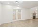 Bright living room featuring double doors, recessed lighting, and tile floors at 3132 Centavo Dr, Las Vegas, NV 89117