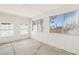 Cozy sunroom features concrete flooring, white walls, and lots of natural light at 3132 Centavo Dr, Las Vegas, NV 89117