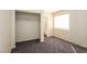 Bedroom featuring a closet, neutral walls, and carpet at 3214 W Gilmore Ave, North Las Vegas, NV 89032