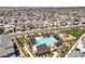 Community aerial view showcasing a pool, playground and modern homes in a Gathering-friendly neighborhood at 3216 Monte Luna Ave, Henderson, NV 89044