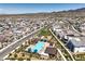 A community with modern homes, a pool, and desert landscaping creates a picturesque neighborhood with mountain views at 3216 Monte Luna Ave, Henderson, NV 89044