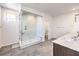 Modern bathroom with a frameless glass shower, sleek fixtures, and stylish tile, offering a luxurious experience at 3216 Monte Luna Ave, Henderson, NV 89044