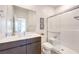 Bright bathroom featuring a sleek vanity, modern fixtures, and a glass-enclosed shower, creating a clean and stylish space at 3216 Monte Luna Ave, Henderson, NV 89044