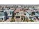 Contemporary two-story home with a tile roof, complemented by desert landscaping for a modern curb appeal at 3216 Monte Luna Ave, Henderson, NV 89044