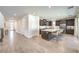 Open kitchen with large island, modern appliances, and seamless flow to the living area at 3216 Monte Luna Ave, Henderson, NV 89044