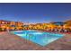 Community pool area offers comfortable lounge seating, perfect for relaxing outdoors at 3216 Monte Luna Ave, Henderson, NV 89044