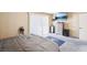 Bedroom with carpet, a neutral palette, with closet, entertainment center, and slider doors at 3233 Kinsale Ct, Las Vegas, NV 89121