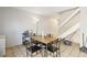 Functional dining room featuring tile flooring and stairway to the second floor at 3233 Kinsale Ct, Las Vegas, NV 89121