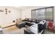Comfortable living area with carpet, tile entryway, and large window providing natural light at 3233 Kinsale Ct, Las Vegas, NV 89121