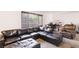 Bright living room with carpet, a comfortable sofa, and a cozy atmosphere at 3233 Kinsale Ct, Las Vegas, NV 89121