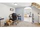 View of the office, which is connected by an arched doorway to the kitchen at 3233 Kinsale Ct, Las Vegas, NV 89121