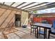 Inviting patio area with a pergola, dining set, and a storage shed at 3233 Kinsale Ct, Las Vegas, NV 89121