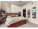 Primary bedroom features hardwood floors and modern decor at 353 E Bonneville Ave # 632, Las Vegas, NV 89101