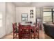 Cozy dining area features hardwood floors, modern decor, and ample seating at 353 E Bonneville Ave # 632, Las Vegas, NV 89101