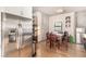 Dining area features modern decor and stainless steel refrigerator at 353 E Bonneville Ave # 632, Las Vegas, NV 89101