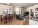 Open-concept living space with dining area, kitchen and modern finishes at 353 E Bonneville Ave # 632, Las Vegas, NV 89101
