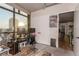 Office features large windows overlooking the city, a desk, and sleek, modern decor at 353 E Bonneville Ave # 632, Las Vegas, NV 89101