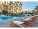Relax by the sparkling pool with comfortable loungers, creating a resort-like experience for residents at 353 E Bonneville Ave # 632, Las Vegas, NV 89101