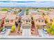 Aerial view of a charming home with a well-manicured lawn in a vibrant neighborhood at 3696 Via Geneva, Henderson, NV 89052