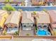 Aerial view of desert home with a pool, spa, and tile roof in a well maintained neighborhood at 3696 Via Geneva, Henderson, NV 89052