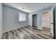 Bedroom with ceiling fan, vinyl flooring and standard closet with sliding doors at 3696 Via Geneva, Henderson, NV 89052
