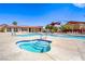 Community pool and kiddie pool with poolside seating and shade at 3696 Via Geneva, Henderson, NV 89052