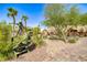 Community sculpture with lush landscaping leading to residential homes at 3696 Via Geneva, Henderson, NV 89052