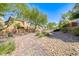 Community sidewalk with beautiful landscaping leading to residential homes at 3696 Via Geneva, Henderson, NV 89052