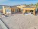View of home under construction with two-car garage, large windows and lake view at 54 Bellissima Lago Ct, Henderson, NV 89011