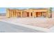 New home construction exterior displaying open framing, offering a glimpse into customizable modern living at 54 Bellissima Lago Ct, Henderson, NV 89011