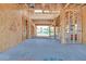 New home construction interior displaying open framing, offering a glimpse into customizable modern living at 54 Bellissima Lago Ct, Henderson, NV 89011