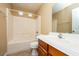 Bathroom featuring a tub, shower, toilet, and vanity sink at 5676 Bettors Luck Ct, Las Vegas, NV 89122