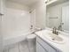 Clean bathroom features a shower-tub combo, toilet, and vanity, offering functionality and style at 676 Covina Dr, Henderson, NV 89002