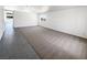 Expansive living area with continuous flooring and versatile space for various furniture arrangements at 676 Covina Dr, Henderson, NV 89002
