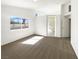 Sunlit main bedroom with a view to the ensuite bathroom, providing a spacious and inviting atmosphere at 676 Covina Dr, Henderson, NV 89002