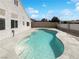 Inviting backyard pool featuring a concrete surround and steps, perfect for relaxation and outdoor enjoyment at 676 Covina Dr, Henderson, NV 89002