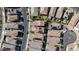 An aerial view shows a residential neighborhood with well-maintained homes and neatly lined streets in a sunny location at 6848 Calvitero St, Las Vegas, NV 89149