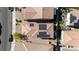 Aerial view of a home's roof with solar panels and backyard, offering energy efficiency at 6848 Calvitero St, Las Vegas, NV 89149