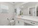 Bright bathroom featuring a vanity, toilet, and stylish décor at 6848 Calvitero St, Las Vegas, NV 89149