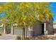 Charming two-story home with a low maintenance front yard and a two-car garage at 6848 Calvitero St, Las Vegas, NV 89149