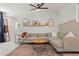 Cozy living room featuring a sectional sofa, decor, natural light, and an open layout at 6848 Calvitero St, Las Vegas, NV 89149