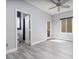 Bedroom with gray walls, white trim, and a window offering ample natural light at 689 Principle Point Ave, Henderson, NV 89012