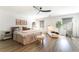 Serene main bedroom featuring neutral tones, wood floors and ample natural light at 7307 Grace Estate Ave, Las Vegas, NV 89113