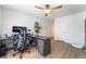 Well-lit office with a long, sleek desk, ergonomic chair, and modern decor at 7307 Grace Estate Ave, Las Vegas, NV 89113