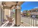 Charming outdoor patio with comfortable chairs and a serene view of the neighborhood at 7732 Canon Walk St, Las Vegas, NV 89139